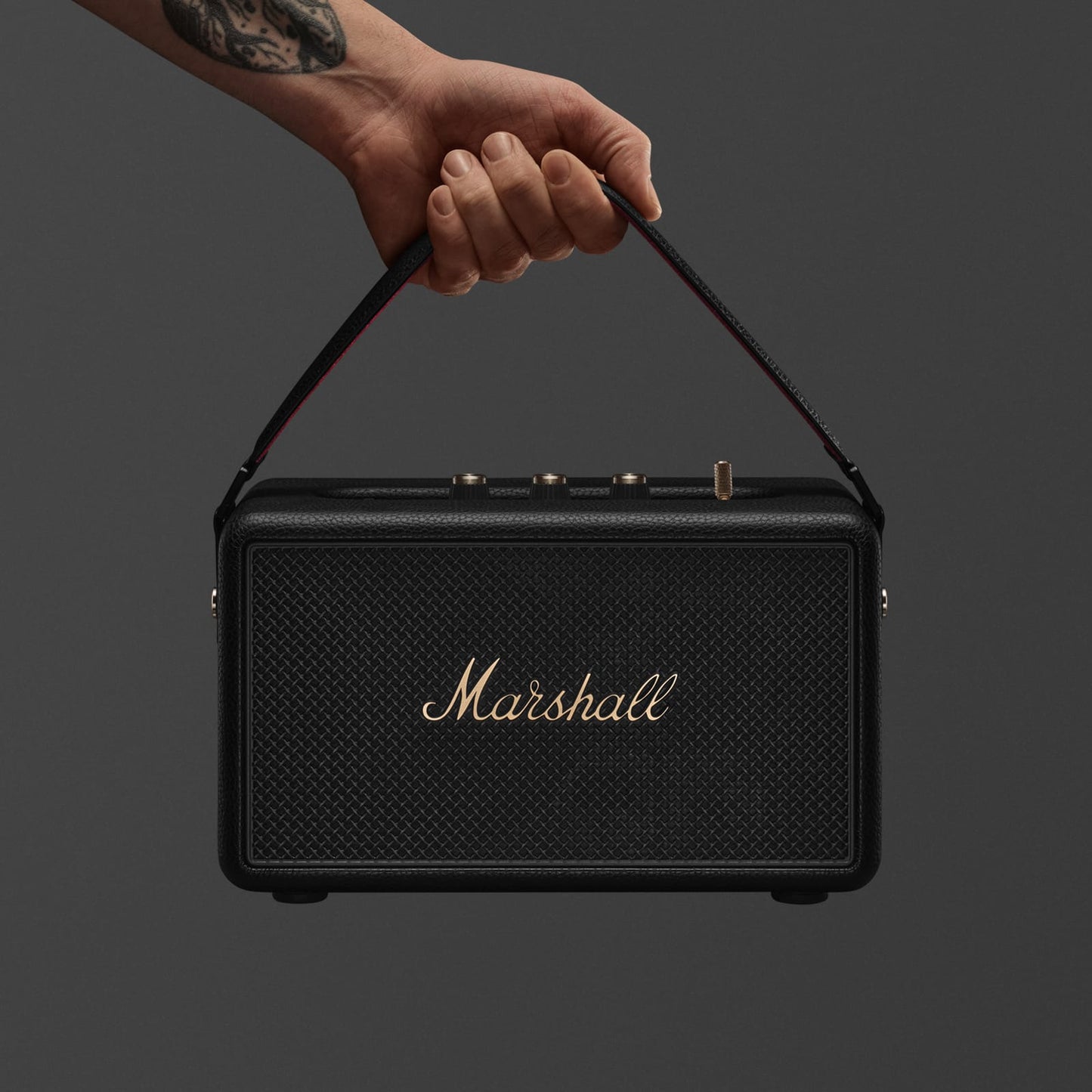 Marshall Kilburn III Black and Brass speaker detail with gold logo