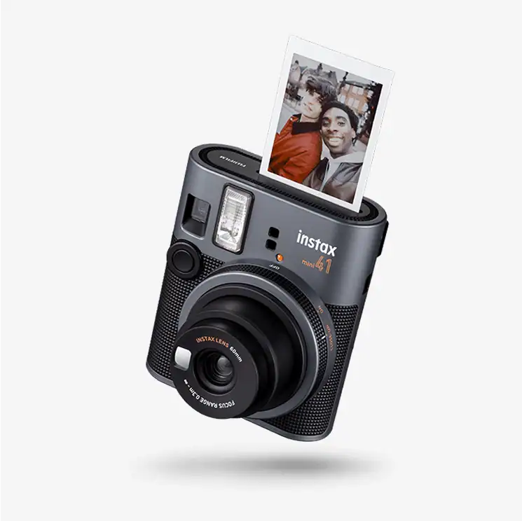 Fujifilm Instax Mini 41 instant camera in Black, side view showing textured body