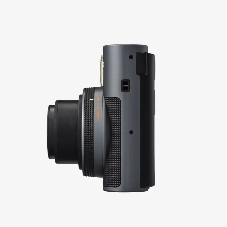 Fujifilm Instax Mini 41 instant camera in Black, close-up of lens and selfie mirror
