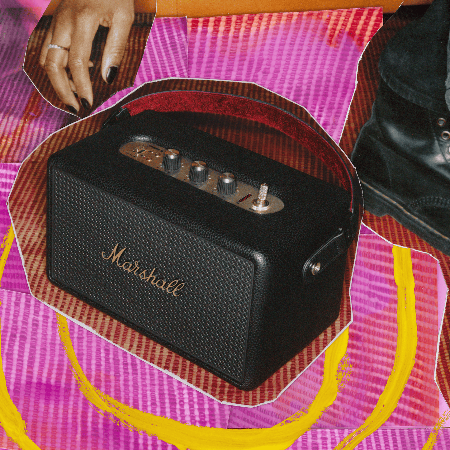Marshall Kilburn III Black and Brass speaker on textured surface