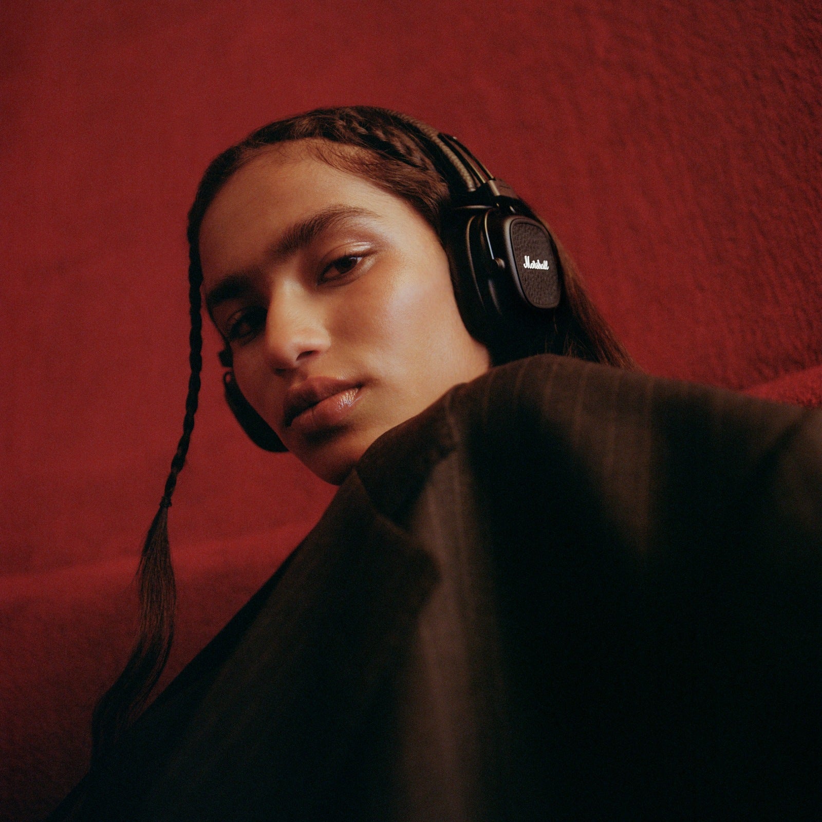 Person wearing Marshall Major V Black on-ear headphones