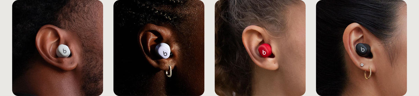 Close up of multiple people wearing Beats Solo Buds in all available colors
