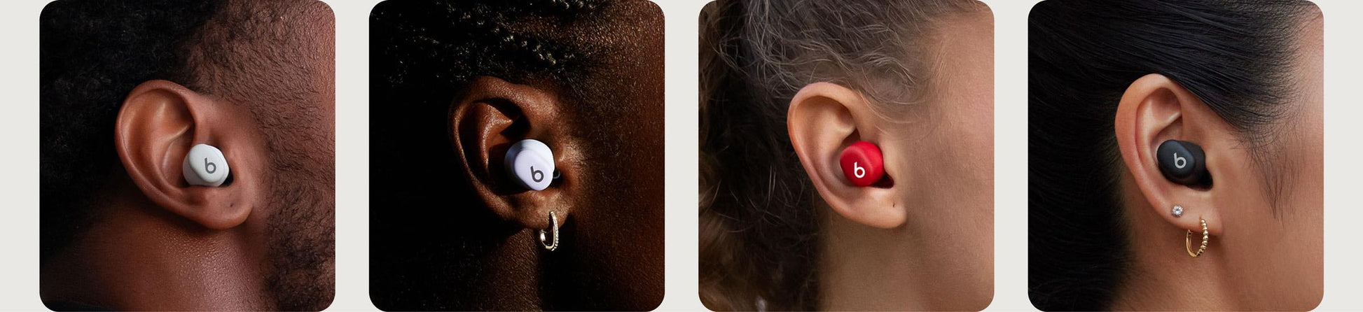 Close up of multiple people wearing Beats Solo Buds in all available colors