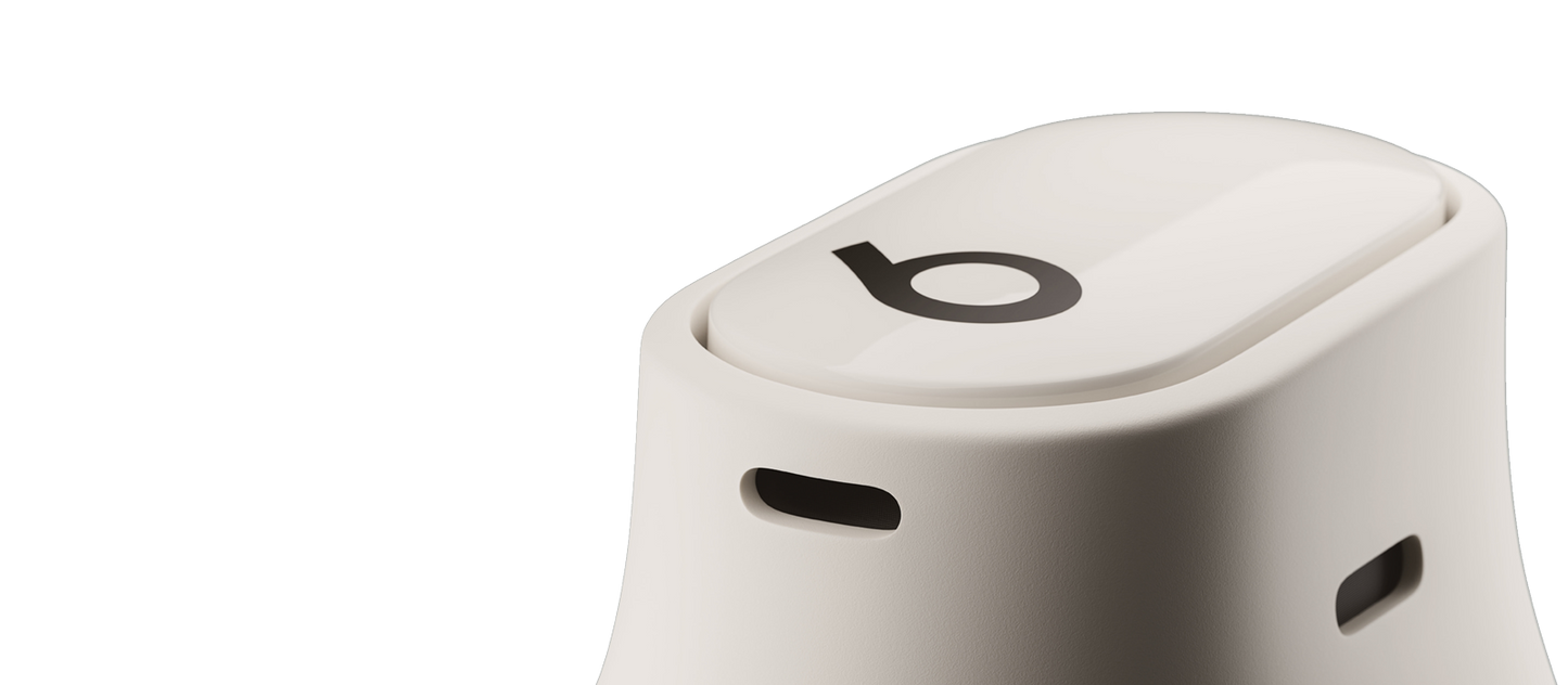 Close-up of Beats Studio Buds Plus acoustic vents in Ivory